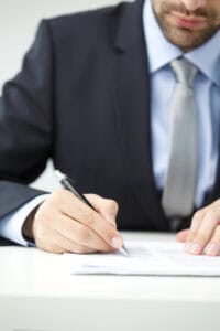 Man filling out TD-1000 form in Denver, CO