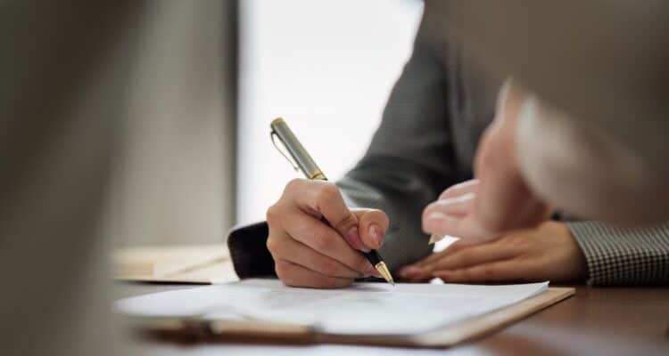 signing at denver title company